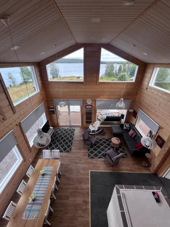 View from the loft over the living room to the lake in summer